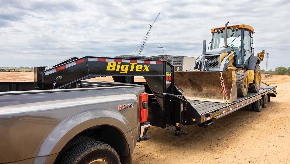 USED 2023 Big Tex 22GN Dual Tandem 10ks Gooseneck with spare tire.  102″x40′ Flat with 8′ Slide In Ramps image 5