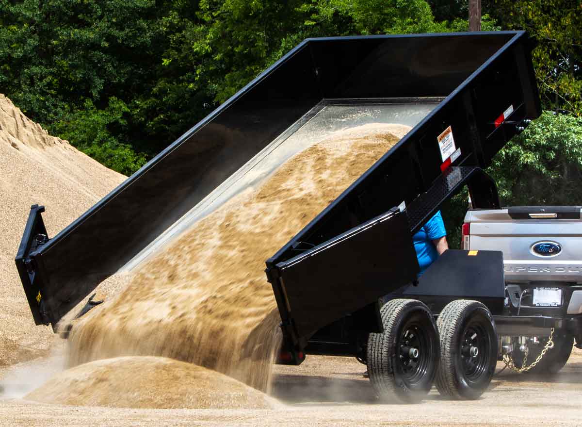 dump trailer at 43 degree angle dumping dirt
